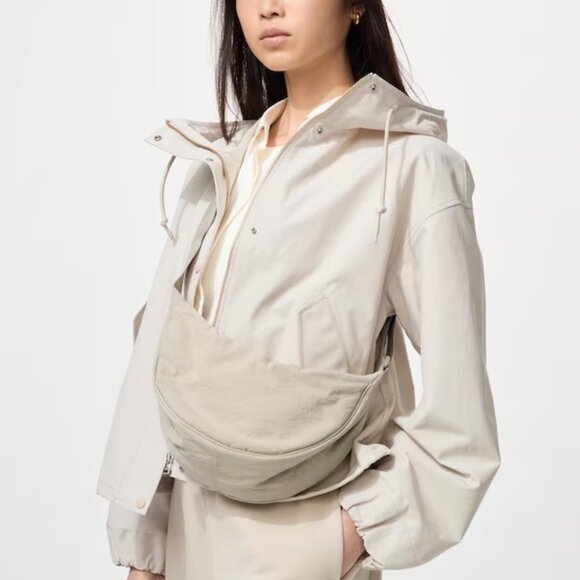 Uniqlo Handbags - Uniqlo Round Mini Crossbody‎ Bag in Beige NWT